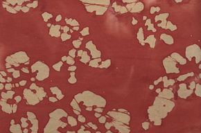 8dce509c-f536-4ef1-b2e6-1f20c0cda4bf Batik orange mit Blumenmuster