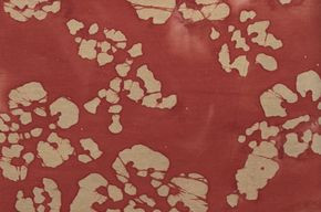 Batik orange mit Blumenmuster